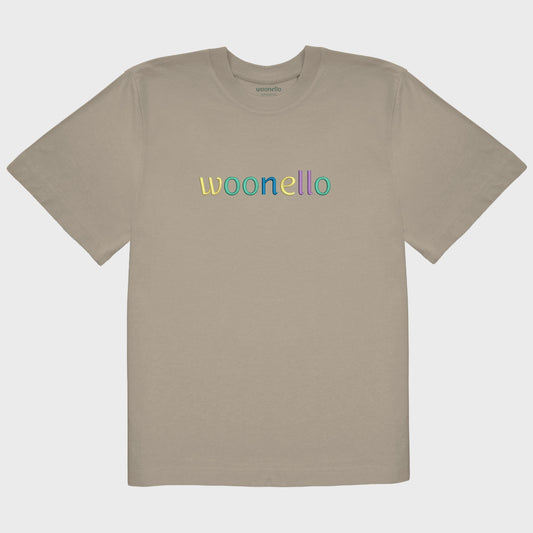 Unisex oversize mastic T-shirt with large embroidered chest design, Woonello brand name in multicolored typography
