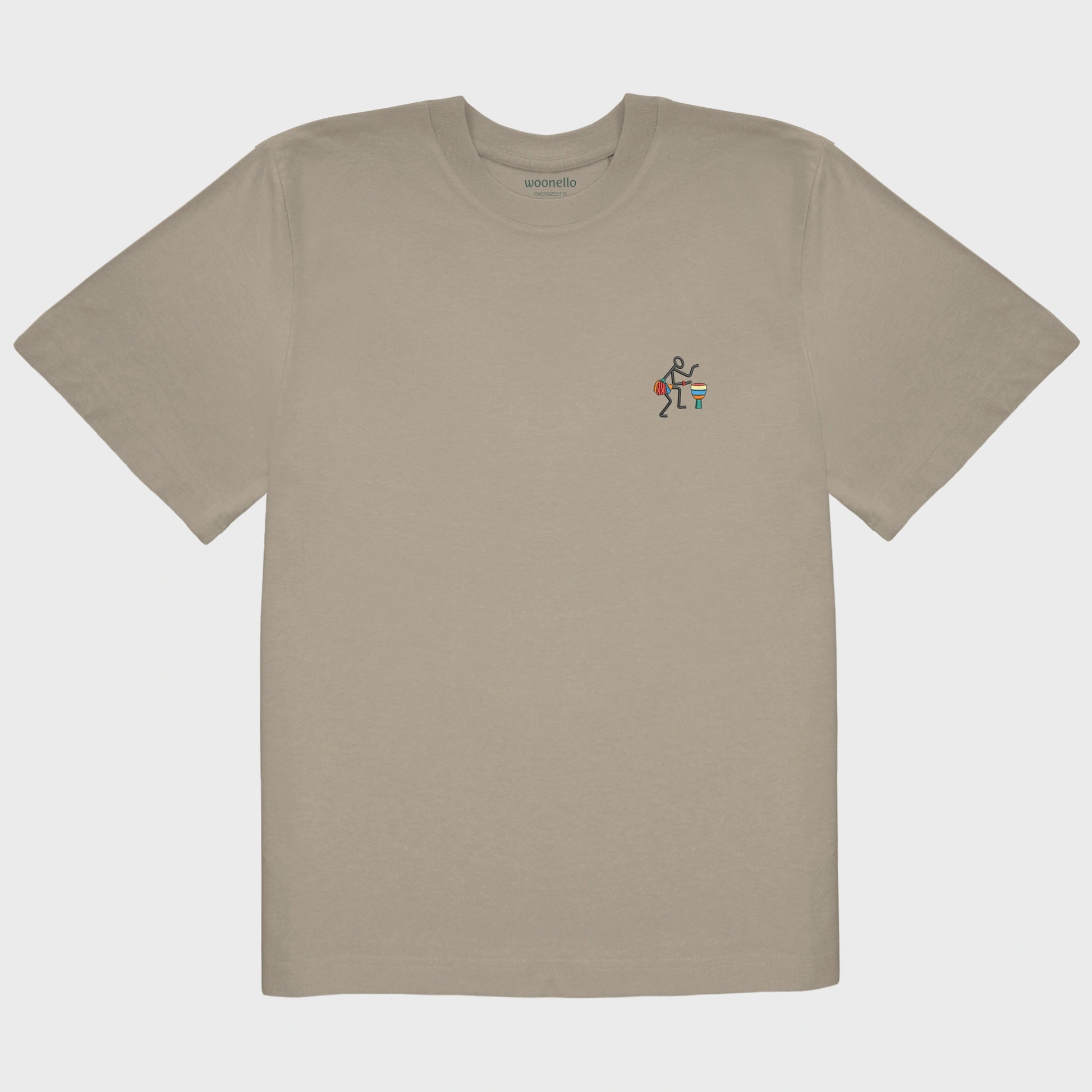 Unisex oversize mastic T-shirt with embroidered chest design, Abstract African musician playing a drum
