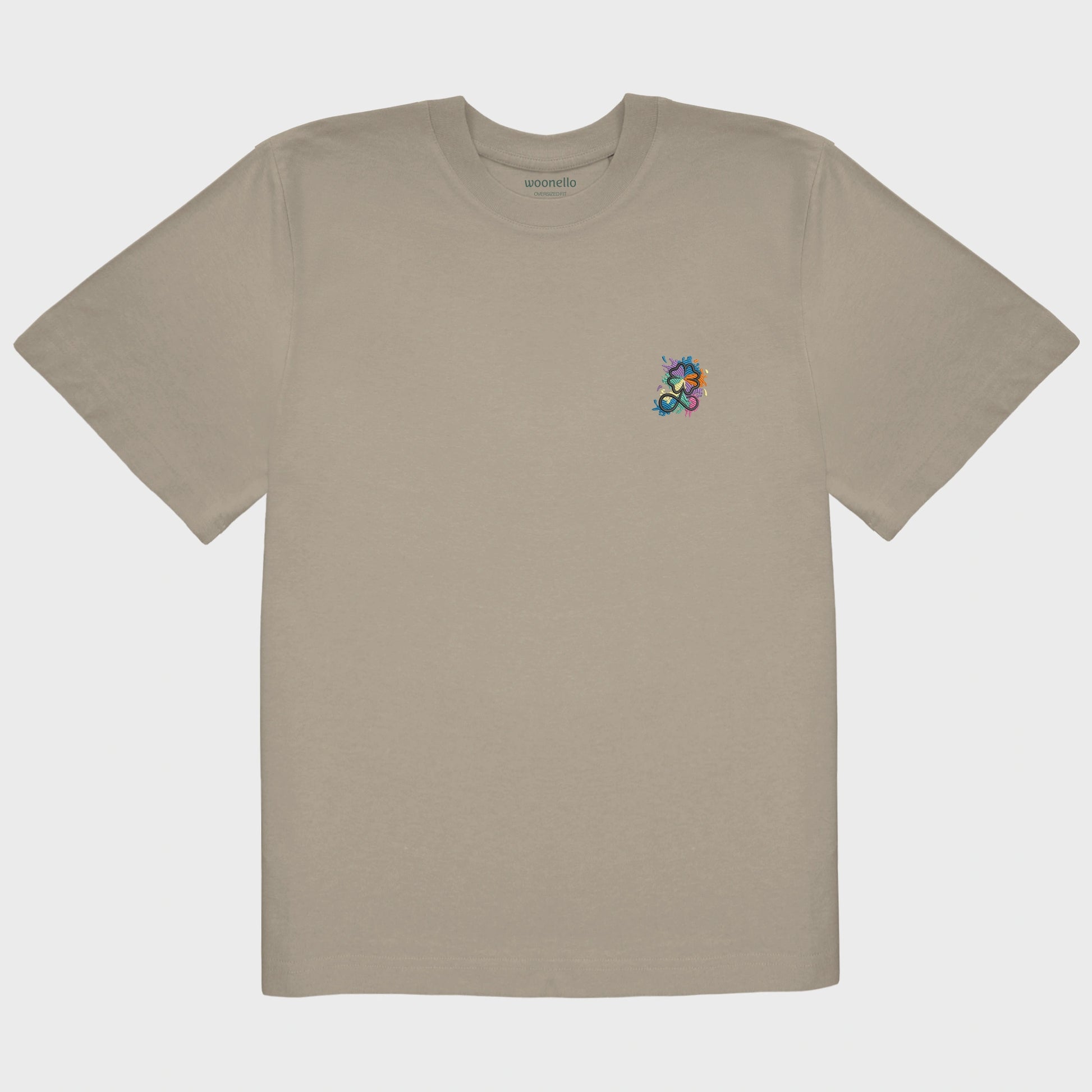 Unisex-T-Shirt Oversize mastic mit bestickter Brustpartie, Kleeblatt-Infinity-Logo im mehrfarbigen Farbspritzer-Design