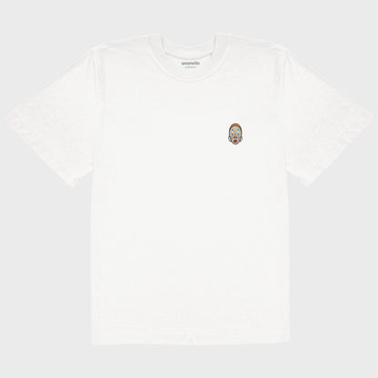 Unisex-T-Shirt Oversize weiß mit bestickter Brustpartie, abstraktes afrikanisches Maske mit halbmondförmigen Augen