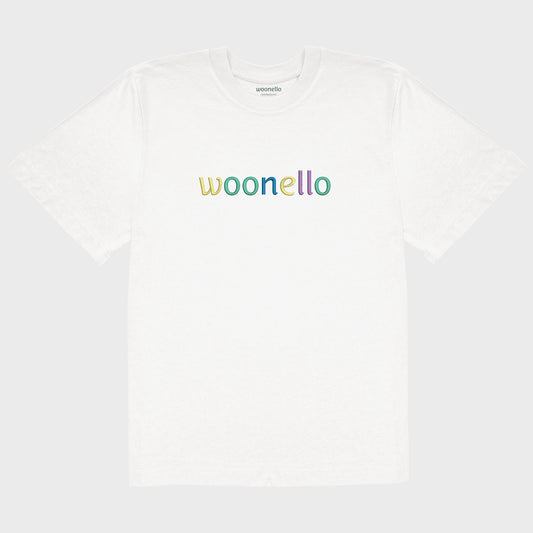 Unisex oversize white T-shirt with large embroidered chest design, Woonello brand name in multicolored typography